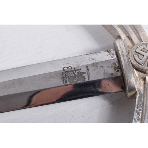 406 - A GERMAN LUFTWAFFE OFFICERS DRESS DAGGER, this has plated mounts, hanger, comes in a dark blue scabb... 