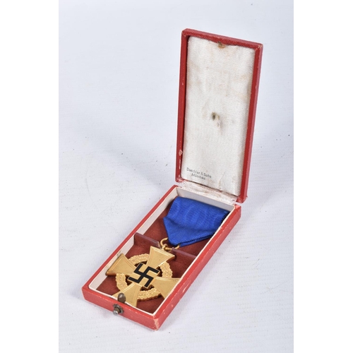 408 - A WWII GERMAN 40 YEAR FAITHFUL SERVICE CROSS MEDAL, this comes on a length of blue ribbon with a pin... 