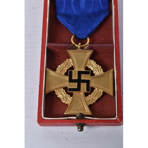 408 - A WWII GERMAN 40 YEAR FAITHFUL SERVICE CROSS MEDAL, this comes on a length of blue ribbon with a pin... 