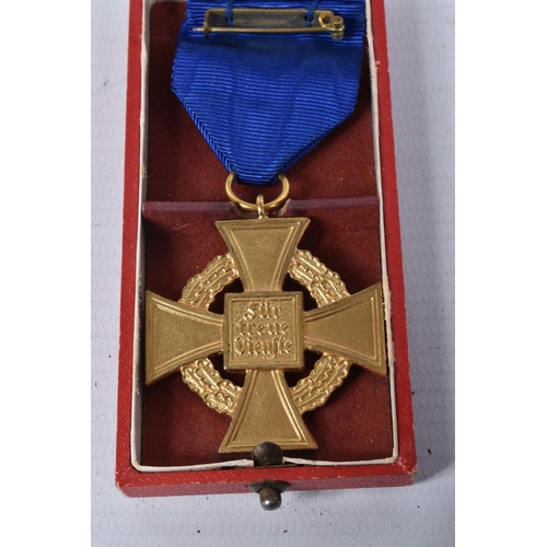 408 - A WWII GERMAN 40 YEAR FAITHFUL SERVICE CROSS MEDAL, this comes on a length of blue ribbon with a pin... 