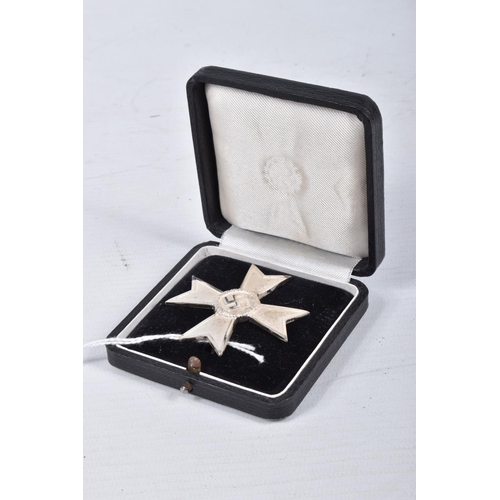 409 - A WWII FIRST CLASS GERMAN WAR MERIT CROSS IN FITTED BOX , this is a die cast silvered example with a... 