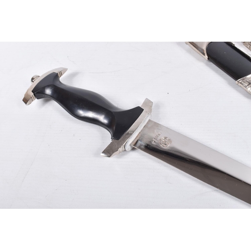 427 - A GERMAN SS DAGGER WITH HANGER, this dagger is for display purposes or for a reenactor to use, it co... 