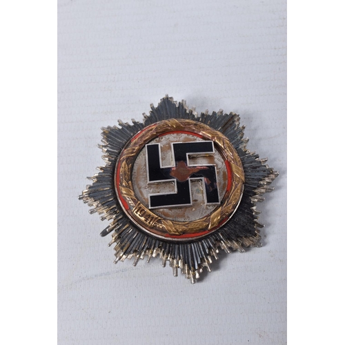 428 - A THIRD REICH GERMAN CROSS, this is marked on the reverse ULRICH MUNDT 5/ST 6.1 9.4.42, G.C, this co... 