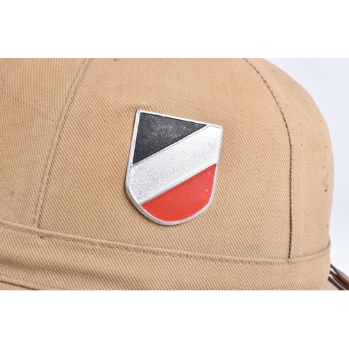 459 - A WWII ERA GERMAN AFRIKACORPS PITH HELMET WITH DECALS, this is the beige coloured tropical sun hat w... 