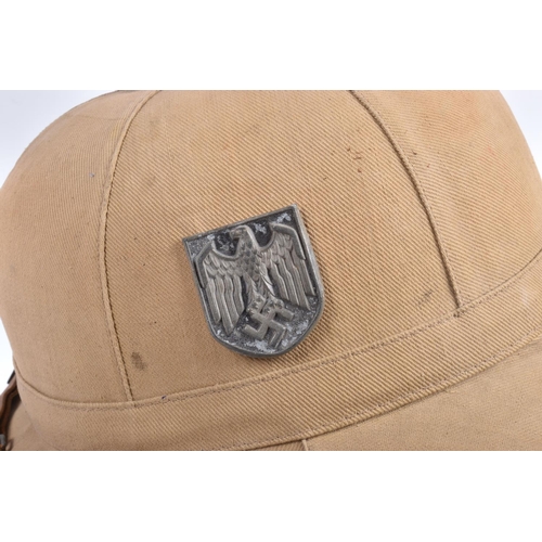 459 - A WWII ERA GERMAN AFRIKACORPS PITH HELMET WITH DECALS, this is the beige coloured tropical sun hat w... 