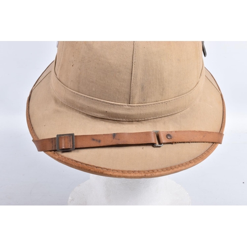 459 - A WWII ERA GERMAN AFRIKACORPS PITH HELMET WITH DECALS, this is the beige coloured tropical sun hat w... 