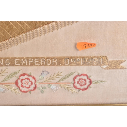 460 - A 1911 FRAMED SILK AND EMBROIDERY NORTHUMBERLAND FUSILIER SAMPLER, this is predominantly gold and re... 