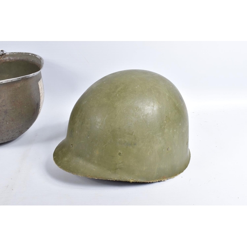 461 - A USA ARMY STEEL HELMET, this is khaki green in colour and traces of black are coming through the pa... 