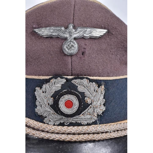 465 - A WWII GERMAN POLITICAL LEADER BROWN CLOTH VISOR CAP, this cap has a cockade, a metal eagle insignia... 