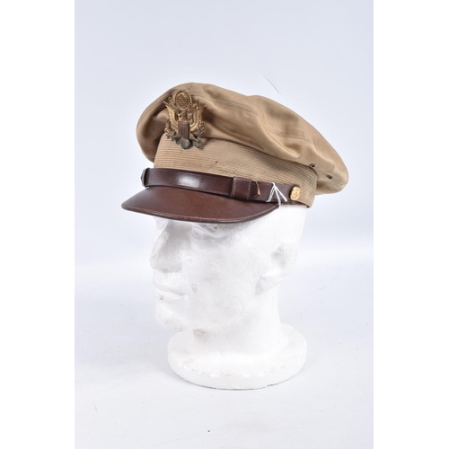 466 - A UNITED STATES OF AMERICA TROPICAL  PEAKED CAP, this is beige and brown with the USA insignia on th... 