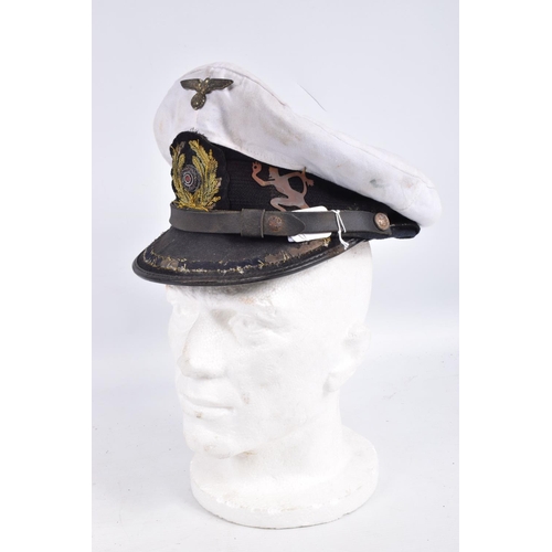 467 - A WWII ERA GERMAN KRIEGSMARINE  U-BOAT OFFICERS CAP, this cap features the soft bullion badge with t... 