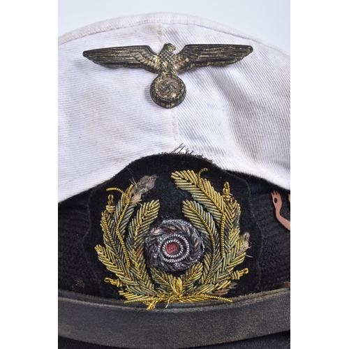 467 - A WWII ERA GERMAN KRIEGSMARINE  U-BOAT OFFICERS CAP, this cap features the soft bullion badge with t... 