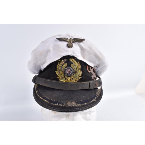 467 - A WWII ERA GERMAN KRIEGSMARINE  U-BOAT OFFICERS CAP, this cap features the soft bullion badge with t... 