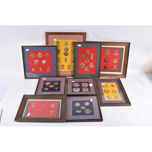 474 - NINE FRAMED AND GLAZED DISPLAYS OF MILITARY CAP BADGES, these are mainly Scottish, Welsh, Artillery ... 