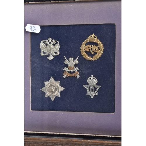 474 - NINE FRAMED AND GLAZED DISPLAYS OF MILITARY CAP BADGES, these are mainly Scottish, Welsh, Artillery ... 