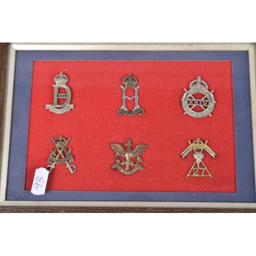 474 - NINE FRAMED AND GLAZED DISPLAYS OF MILITARY CAP BADGES, these are mainly Scottish, Welsh, Artillery ... 