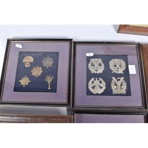 474 - NINE FRAMED AND GLAZED DISPLAYS OF MILITARY CAP BADGES, these are mainly Scottish, Welsh, Artillery ... 