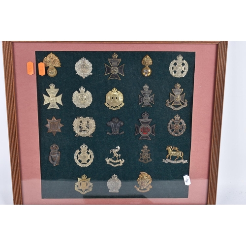 475 - SEVEN FRAMED AND GLAZED DISPLAY OF MILITARY CAP BADGES, they cover different eras of the twentieth c... 