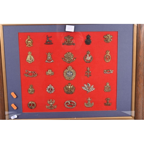 476 - TWO LARGE FRAMED AND GLAZED SETS OF MILITARY CAP BADGES, the badges cover different eras and include... 