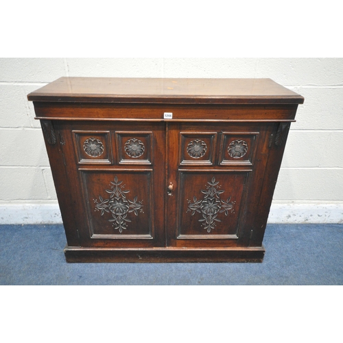 1244 - A 19TH CENTURY MAHOGANY CHIFFONIER BASE, the double panelled doors with floral carving, length 102cm... 