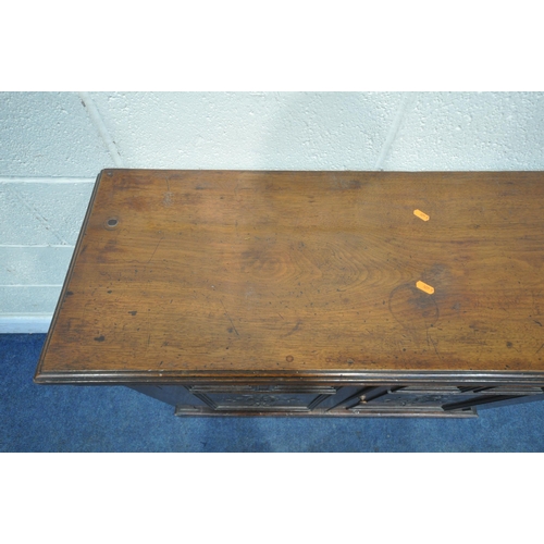 1244 - A 19TH CENTURY MAHOGANY CHIFFONIER BASE, the double panelled doors with floral carving, length 102cm... 