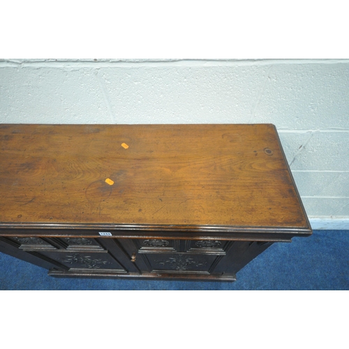 1244 - A 19TH CENTURY MAHOGANY CHIFFONIER BASE, the double panelled doors with floral carving, length 102cm... 