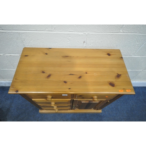 1246 - A MODERN PINE CABINET, with five drawers and a single cupboard door, width 71cm x depth 35cm x heigh... 