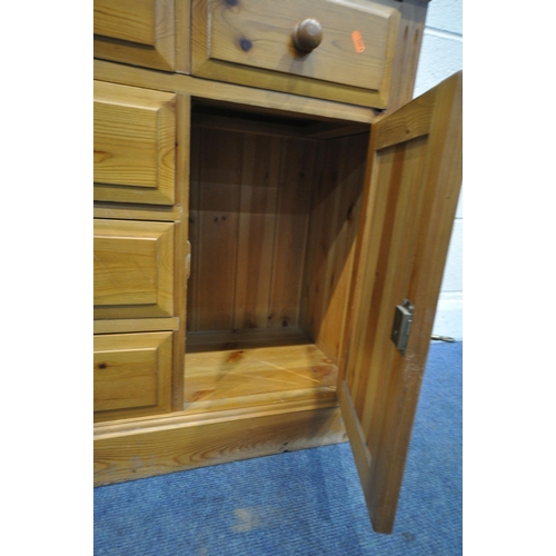 1246 - A MODERN PINE CABINET, with five drawers and a single cupboard door, width 71cm x depth 35cm x heigh... 