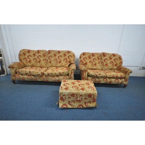 1295 - A GOLDEN GAINSBOROUGH GOLD THREE PIECE LOUNGE SUITE, with floral red patterns, comprising a three se... 