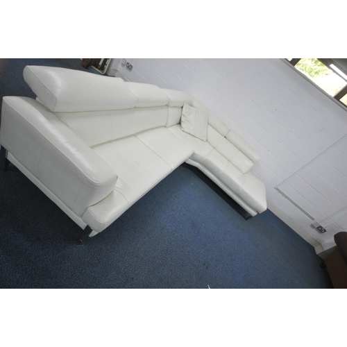 1297 - A WHITE LEATHER L SHAPED CORNER SOFA, with three adjustable head rests, on shaped metal legs, longes... 