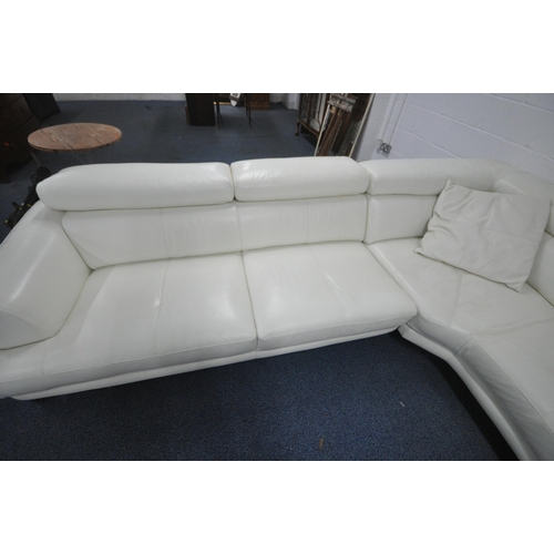 1297 - A WHITE LEATHER L SHAPED CORNER SOFA, with three adjustable head rests, on shaped metal legs, longes... 