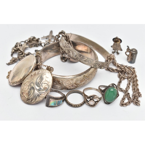 14 - A BAG OF SILVER AND WHITE METAL JEWELLERY, to include a foliage detailed hinged bangle, hallmarked B... 