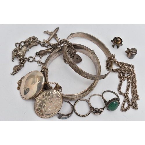 14 - A BAG OF SILVER AND WHITE METAL JEWELLERY, to include a foliage detailed hinged bangle, hallmarked B... 