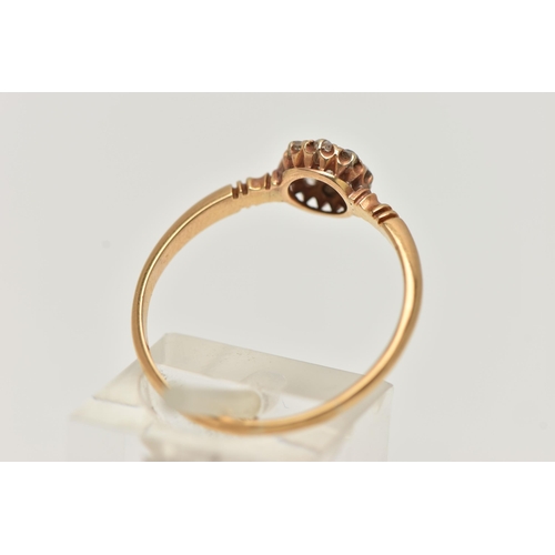 26 - AN EARLY 20TH CENTURY 18CT GOLD DIAMOND RING, designed as a central old cut diamond surrounded by ei... 