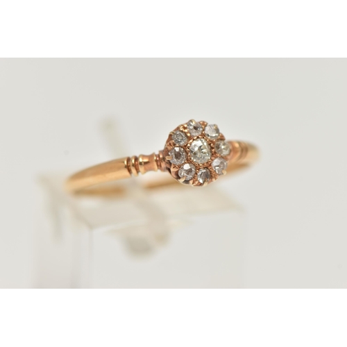 26 - AN EARLY 20TH CENTURY 18CT GOLD DIAMOND RING, designed as a central old cut diamond surrounded by ei... 