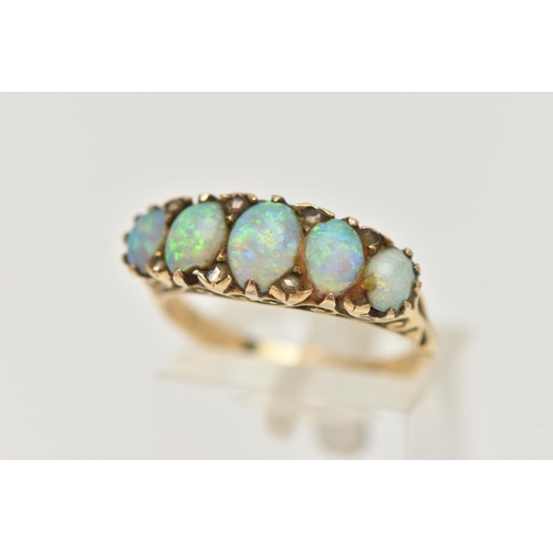 27 - A LATE VICTORIAN OPAL AND DIAMOND RING, designed as a line of five graduated oval opal cabochons int... 