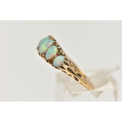 27 - A LATE VICTORIAN OPAL AND DIAMOND RING, designed as a line of five graduated oval opal cabochons int... 