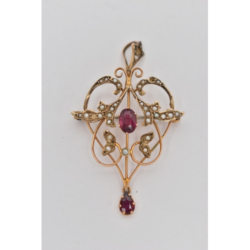 31 - AN EARLY 20TH CENTURY OPENWORK GARNET AND SPLIT PEARL PENDANT, of scrolling organic leaf design, set... 