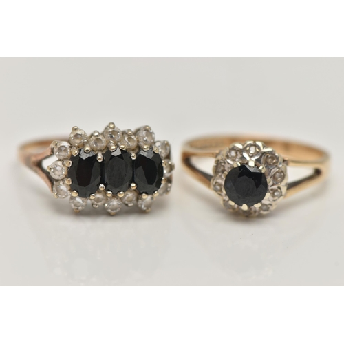 32 - TWO 9CT GOLD SAPPHIRE DRESS RINGS, the first designed as a circular sapphire within a single cut dia... 