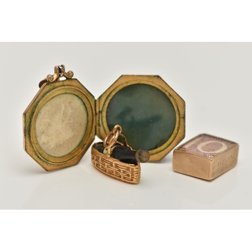 33 - TWO 9CT GOLD CHARMS AND A LOCKET, the first charm designed as a 9ct gold basket containing a wine bo... 