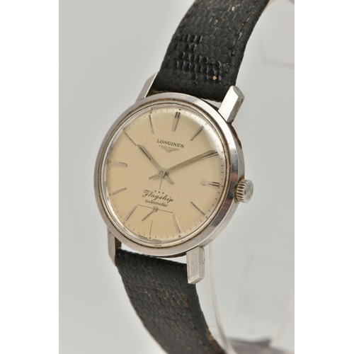 36 - A LONGINES FLAGSHIP AUTOMATIC WRISTWATCH, the circular face in a light gold colour, with baton marke... 