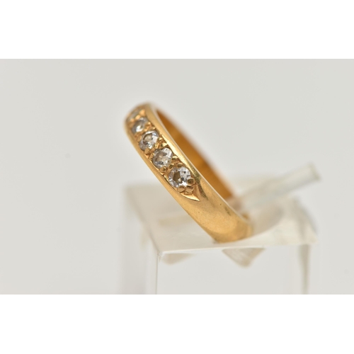 54 - A 22CT GOLD DIAMOND BAND RING, a combination of single cut and round brilliant diamonds, seven diamo... 