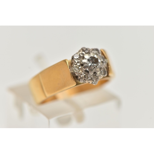 55 - A 22CT GOLD DIAMOND CLUSTER RING, a round brilliant cut diamond, set with a halo of eight single cut... 