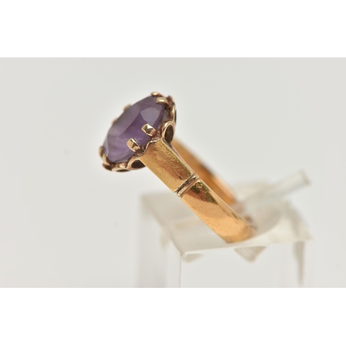 56 - A 22CT GOLD GEM SET RING, oval cut amethyst, prong set in yellow gold, hallmarked 22ct Birmingham, r... 