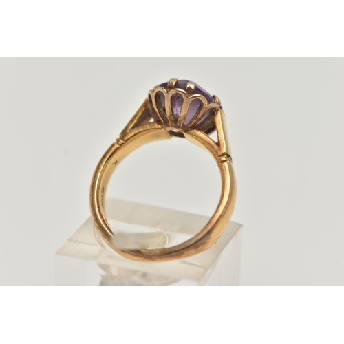 56 - A 22CT GOLD GEM SET RING, oval cut amethyst, prong set in yellow gold, hallmarked 22ct Birmingham, r... 