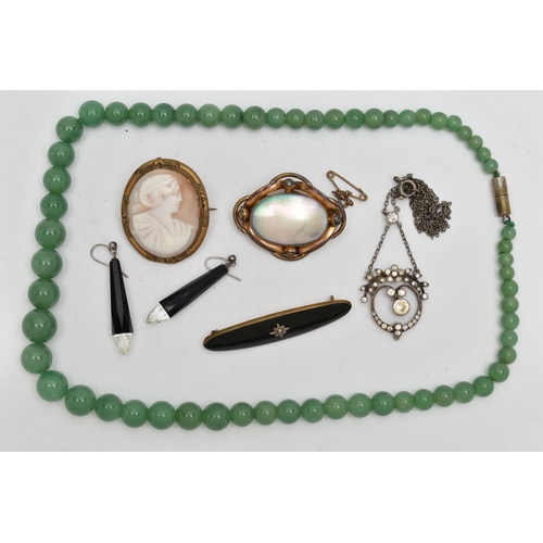 68 - A BAG OF ASSORTED JEWELLERY, to include a base metal carved shell cameo brooch, a shell and base met... 