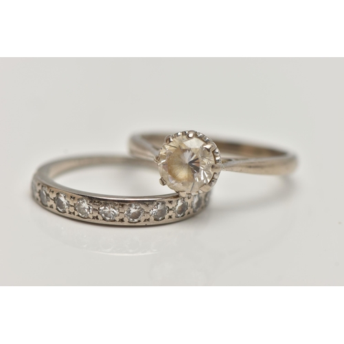 78 - A DIAMOND HALF ETERNITY RING AND AN 18CT GOLD PASTE RING, the first designed as a line of eleven bri... 