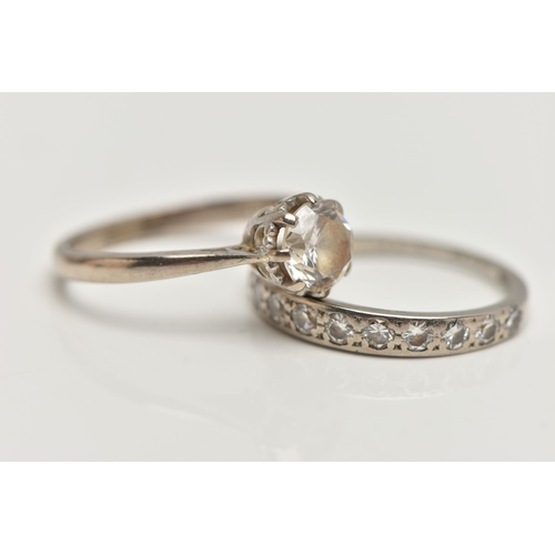 78 - A DIAMOND HALF ETERNITY RING AND AN 18CT GOLD PASTE RING, the first designed as a line of eleven bri... 