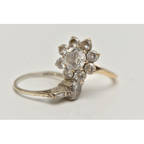 80 - TWO 9CT GOLD CUBIC ZIRCONIA SET RINGS, the first a circular cluster design, the second a three stone... 