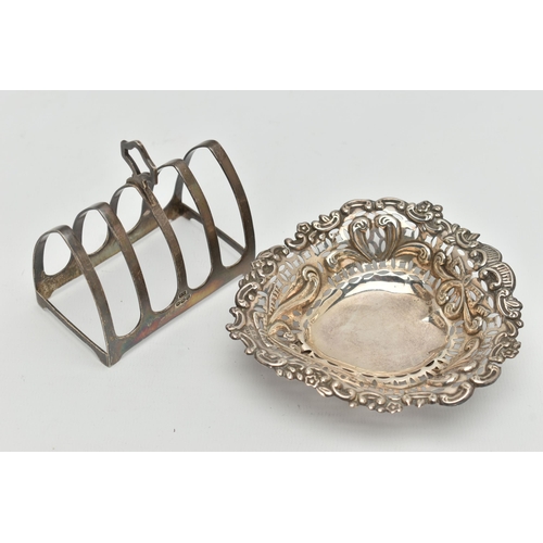 102 - A LATE VICTORIAN SILVER DISH AND A TOAST RACK, the heart shape bonbon dish with scrolling decoration... 